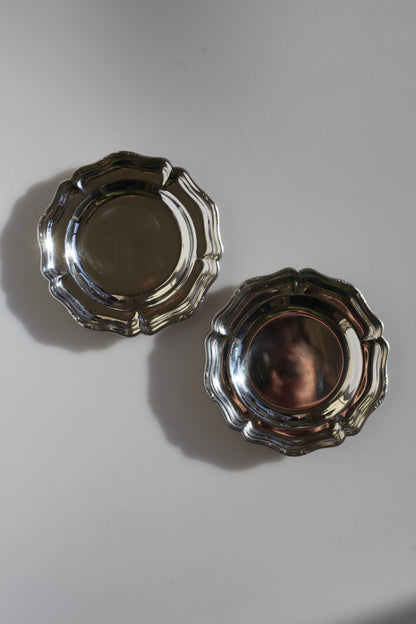 Set van ronde inox bordjes