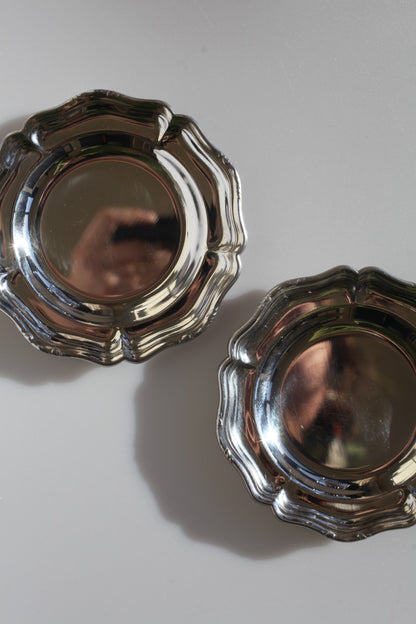 Set van ronde inox bordjes